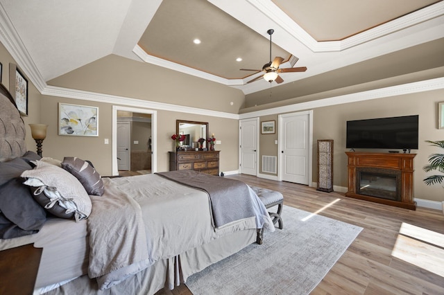 43 Enclave Dr, Somerset, KY 42503 - bedroom featuring recessed lighting, wood finished floors, a glass covered fireplace, baseboards, and crown molding