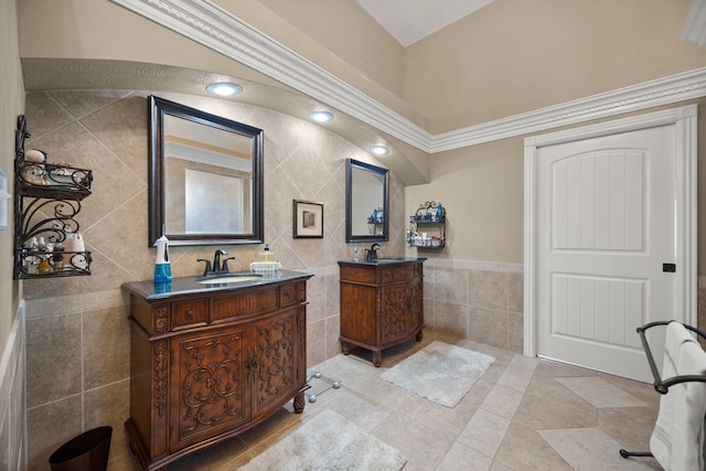 43 Enclave Dr, Somerset, KY 42503 - full bathroom with tile walls, two vanities, tile patterned flooring, and wainscoting