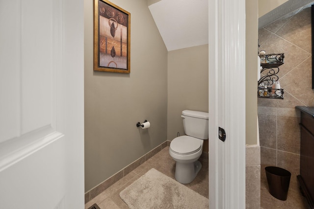 43 Enclave Dr, Somerset, KY 42503 - bathroom featuring lofted ceiling, toilet, and vanity