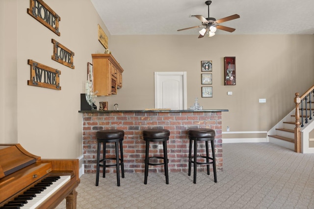 43 Enclave Dr, Somerset, KY 42503 - indoor bar with light carpet, stairway, a ceiling fan, and baseboards