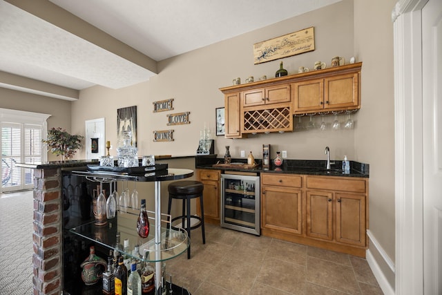43 Enclave Dr, Somerset, KY 42503 - indoor wet bar featuring wine cooler, light tile patterned floors, and baseboards