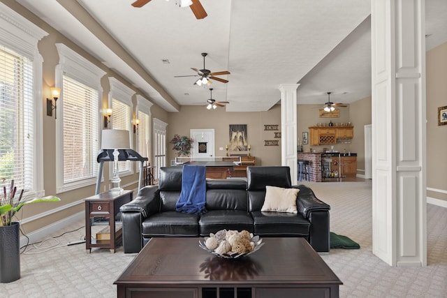 43 Enclave Dr, Somerset, KY 42503 - living room featuring ceiling fan, decorative columns, light colored carpet, and baseboards
