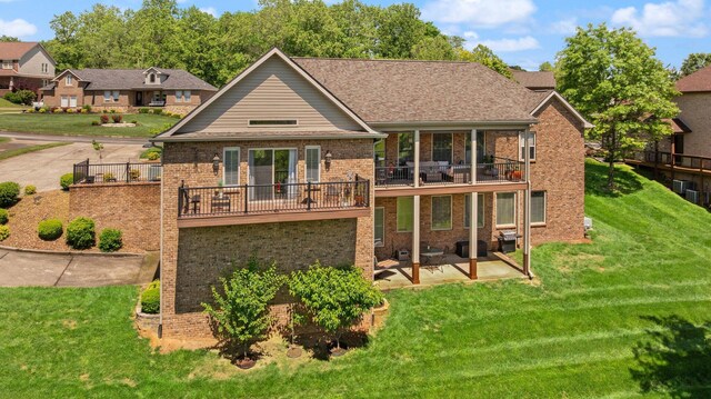 43 Enclave Dr, Somerset, KY 42503 - rear view of property with a yard, brick siding, a balcony, and a patio