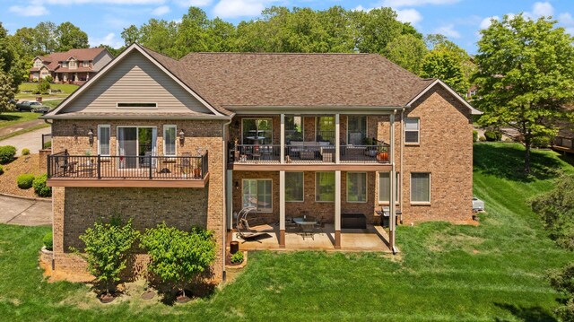 43 Enclave Dr, Somerset, KY 42503 - back of house featuring a yard, brick siding, a patio, and a balcony