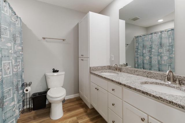 350 Misty Dr, Somerset, KY 42503 - full bathroom featuring toilet, wood finished floors, double vanity, baseboards, and curtained shower