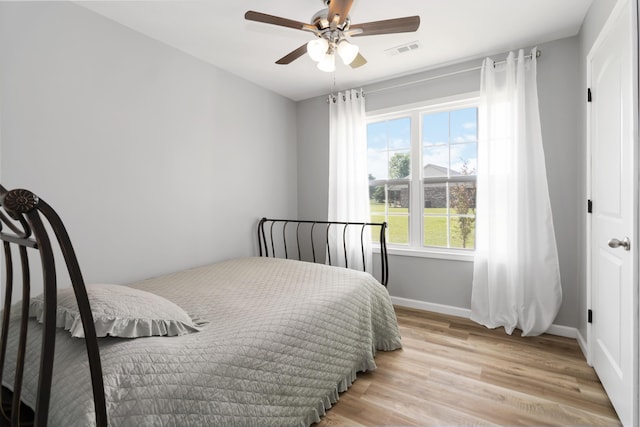 350 Misty Dr, Somerset, KY 42503 - bedroom with light wood-type flooring, baseboards, and a ceiling fan