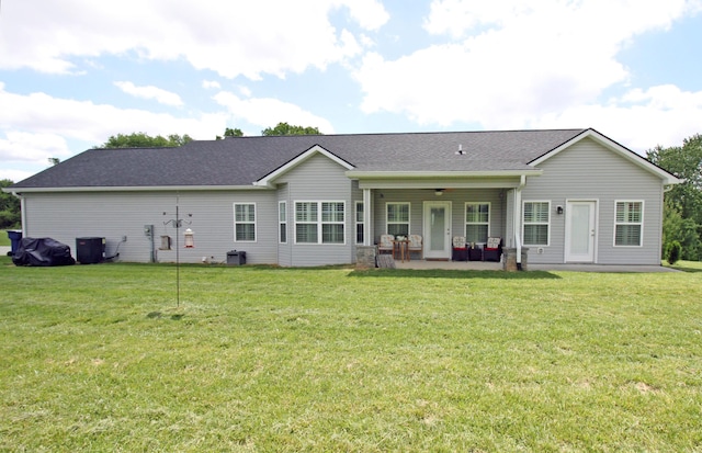 156 Kaydons Way, Somerset, KY 42503 - back of property featuring a patio, a lawn, and roof with shingles