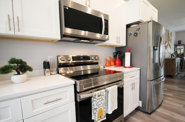 156 Kaydons Way, Somerset, KY 42503 - kitchen with appliances with stainless steel finishes, white cabinets, and wood finished floors