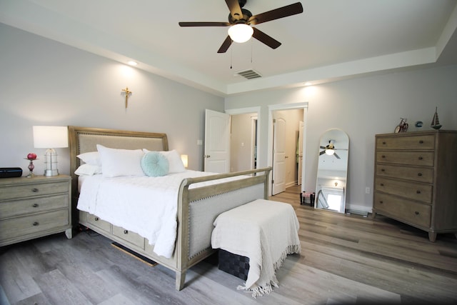 156 Kaydons Way, Somerset, KY 42503 - bedroom featuring wood finished floors, a raised ceiling, a ceiling fan, and baseboards