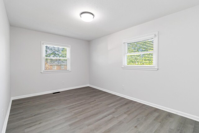1708 Biloxi Ct, Lexington, KY 40505 - empty room with wood finished floors and baseboards