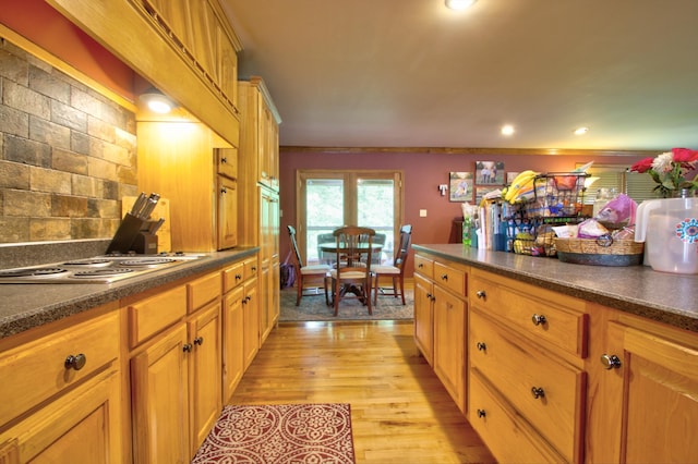 73 Redwood Ln, East Bernstadt, KY 40729 - kitchen featuring dark countertops, brown cabinets, stainless steel electric cooktop, light wood-style flooring, and recessed lighting