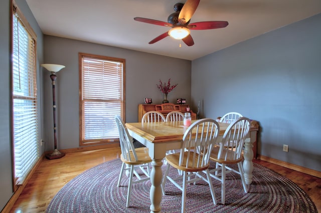 73 Redwood Ln, East Bernstadt, KY 40729 - dining room with ceiling fan, light wood finished floors, and baseboards