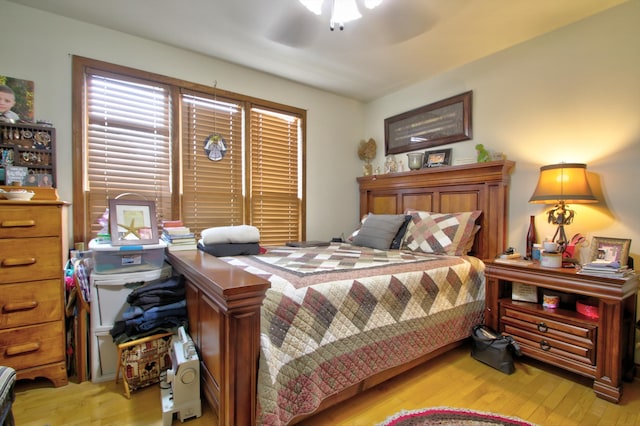 73 Redwood Ln, East Bernstadt, KY 40729 - bedroom with light wood-style flooring and a ceiling fan