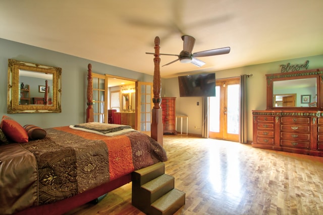 73 Redwood Ln, East Bernstadt, KY 40729 - bedroom featuring access to exterior, wood finished floors, french doors, ceiling fan, and baseboards