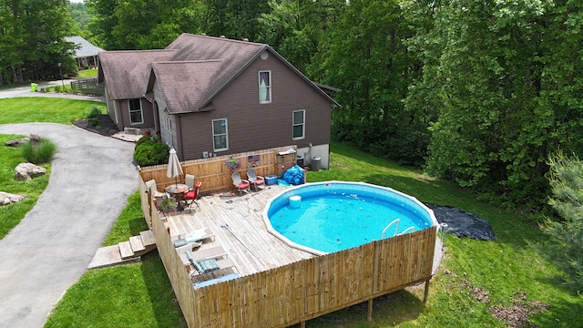 73 Redwood Ln, East Bernstadt, KY 40729 - outdoor pool with a wooden deck and a yard