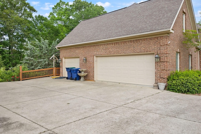 187 Woodside Dr, Somerset, KY 42503 - view of property exterior with brick siding, a shingled roof, and concrete driveway