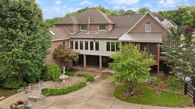 187 Woodside Dr, Somerset, KY 42503 - back of house featuring brick siding and a shingled roof