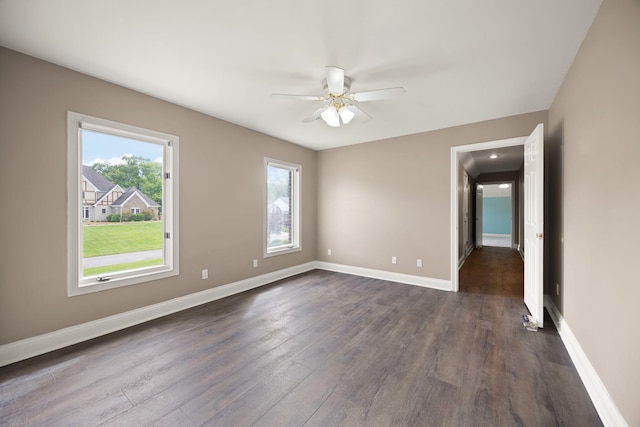 187 Woodside Dr, Somerset, KY 42503 - empty room featuring ceiling fan, dark wood finished floors, and baseboards