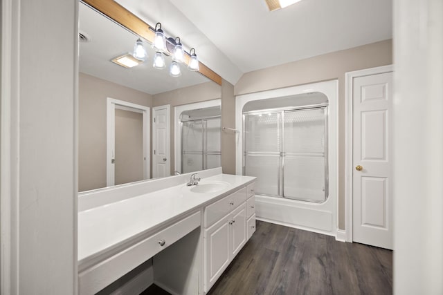 187 Woodside Dr, Somerset, KY 42503 - full bathroom with wood finished floors, vanity, and combined bath / shower with glass door