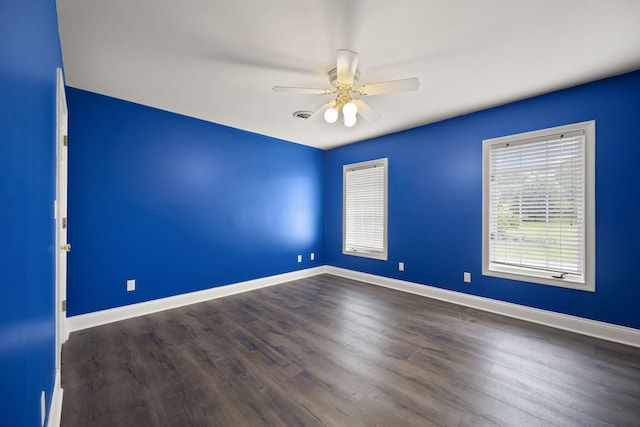 187 Woodside Dr, Somerset, KY 42503 - empty room with a ceiling fan, baseboards, and dark wood-type flooring