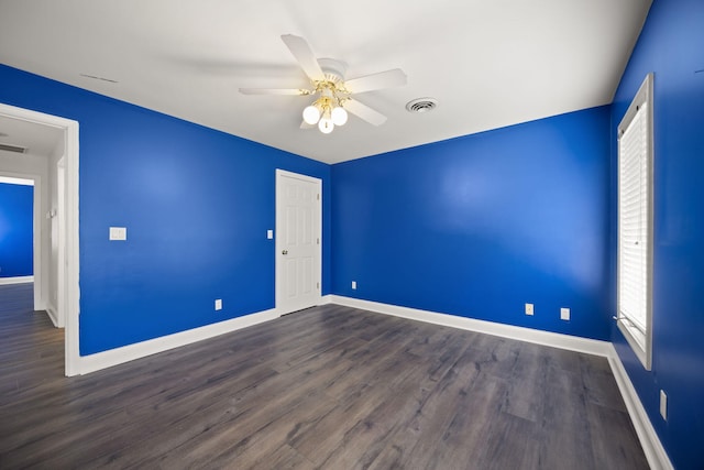 187 Woodside Dr, Somerset, KY 42503 - spare room with baseboards, ceiling fan, and dark wood-style flooring