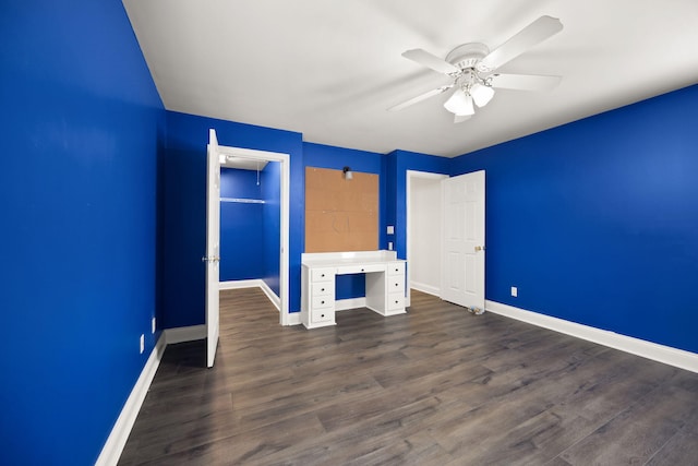 187 Woodside Dr, Somerset, KY 42503 - unfurnished bedroom with baseboards, dark wood finished floors, and a ceiling fan