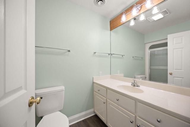 187 Woodside Dr, Somerset, KY 42503 - full bath with toilet, baseboards, a shower with shower door, vanity, and wood finished floors