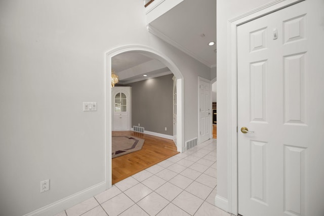 187 Woodside Dr, Somerset, KY 42503 - corridor featuring arched walkways, crown molding, baseboards, light tile patterned floors, and recessed lighting