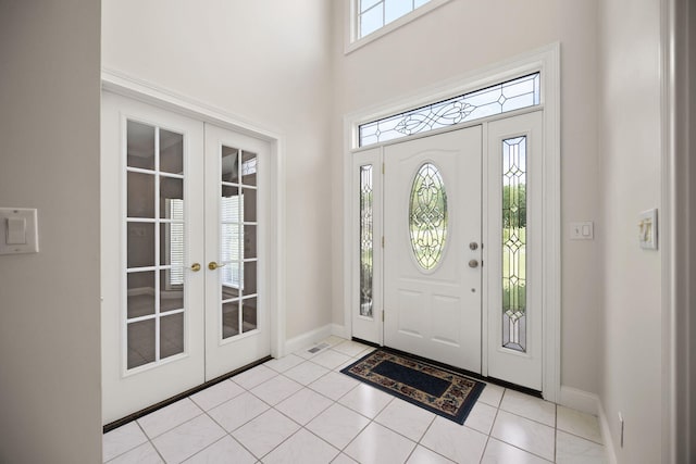 187 Woodside Dr, Somerset, KY 42503 - foyer entrance featuring french doors, baseboards, a high ceiling, and light tile patterned floors
