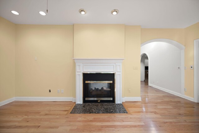 187 Woodside Dr, Somerset, KY 42503 - detailed view of arched walkways, wood finished floors, baseboards, and recessed lighting