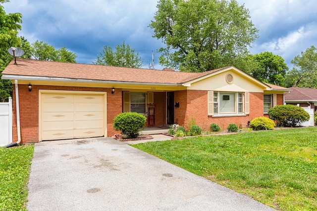 1026 Arapaho Trl, Frankfort, KY 40601 - ranch-style home with brick siding, a garage, and driveway