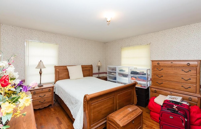 1026 Arapaho Trl, Frankfort, KY 40601 - bedroom featuring wallpapered walls and wood finished floors