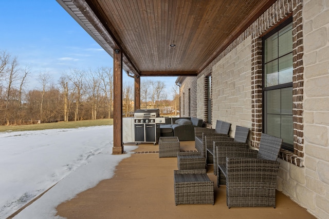 view of patio with an outdoor hangout area and grilling area