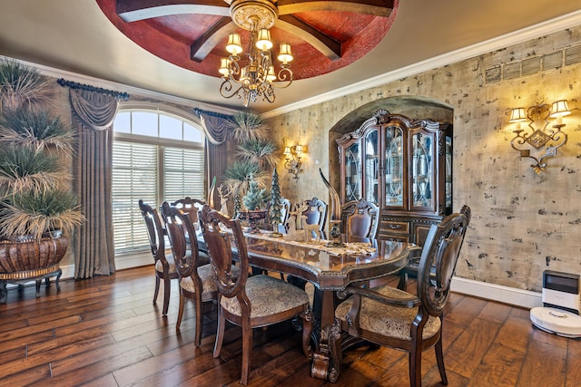 dining space with hardwood / wood-style flooring, baseboards, a chandelier, beamed ceiling, and ceiling fan