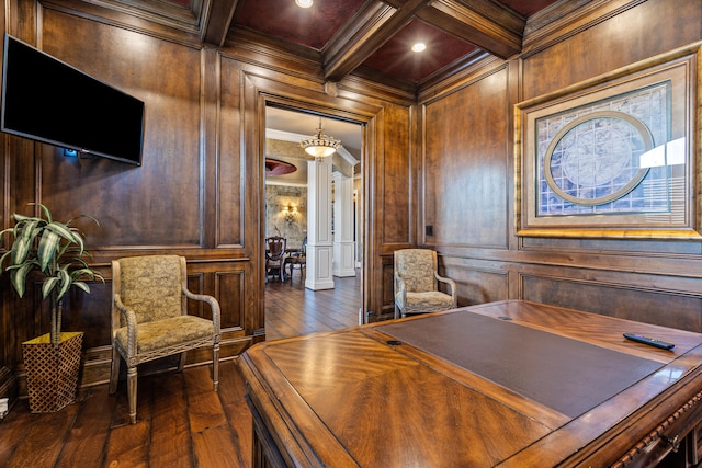 home office with dark wood-style flooring, a decorative wall, beamed ceiling, ornamental molding, and coffered ceiling