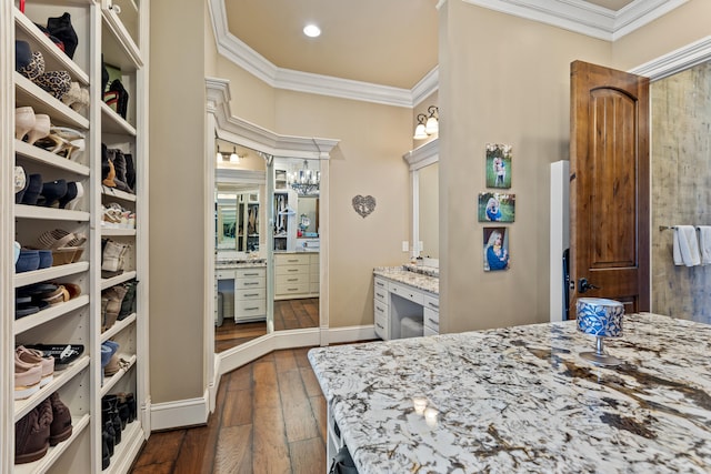 bedroom featuring crown molding, dark wood-style floors, recessed lighting, and baseboards