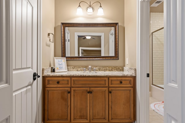 full bath featuring vanity, shower / washtub combination, ceiling fan, and tile patterned floors