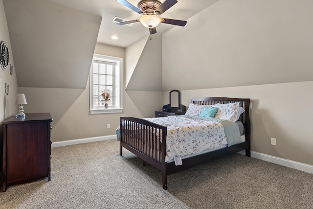 bedroom featuring lofted ceiling, carpet flooring, baseboards, and ceiling fan