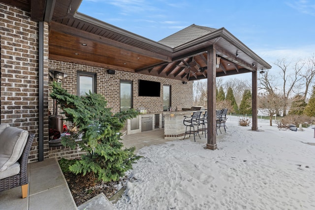 view of patio featuring ceiling fan