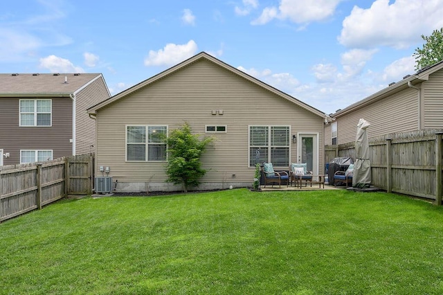 back of property with a patio and central AC unit