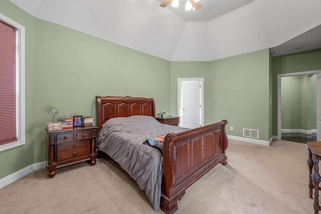 bedroom with light colored carpet, baseboards, a ceiling fan, and high vaulted ceiling