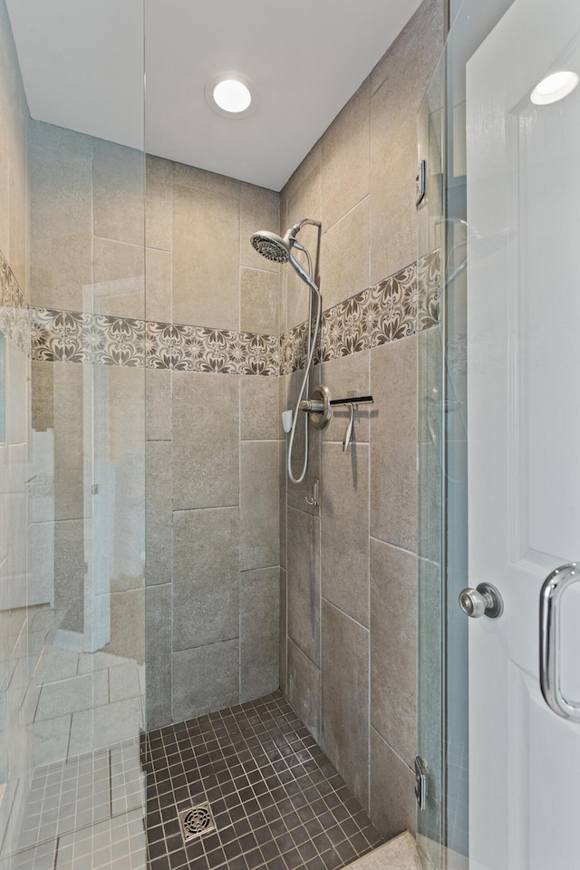 bathroom featuring a stall shower
