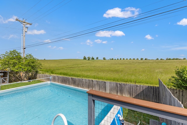 view of pool featuring a rural view