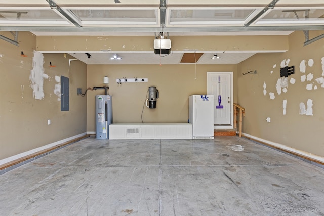 garage featuring electric water heater, freestanding refrigerator, electric panel, a garage door opener, and a central vacuum unit