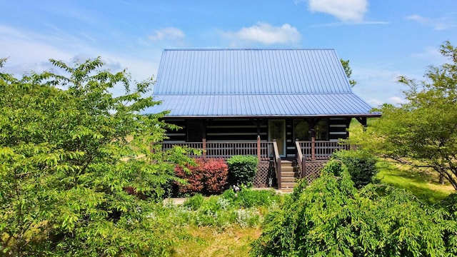 1648 Burdette Knob Rd, Lancaster, KY 40444 - view of front of house with covered porch, stairway, metal roof, and log siding