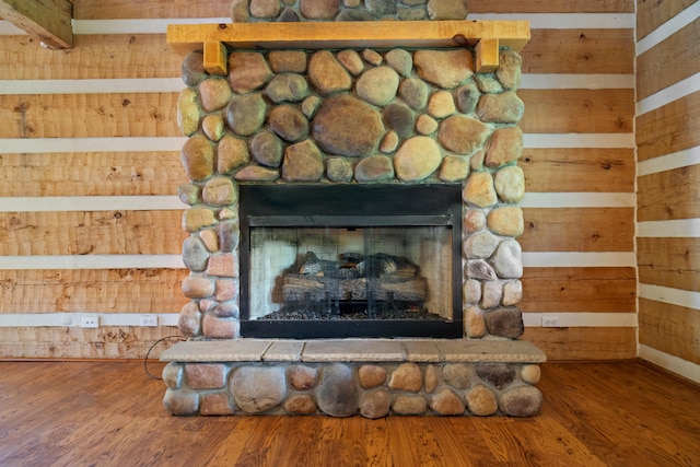 1648 Burdette Knob Rd, Lancaster, KY 40444 - detailed view of a stone fireplace, wood finished floors, and wooden walls