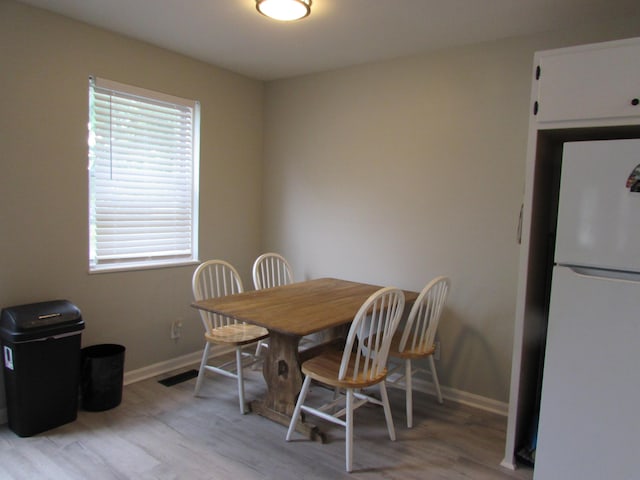 324 Spruce Dr, Frankfort, KY 40601 - dining room with baseboards and light wood-style floors