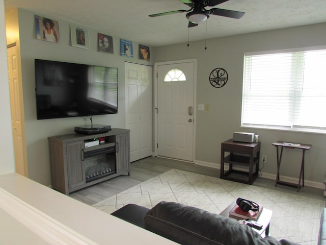 324 Spruce Dr, Frankfort, KY 40601 - living room featuring a ceiling fan and baseboards