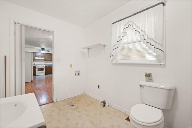 279 Hatton Creek Rd, Stanton, KY 40380 - bathroom with tile patterned floors, a sink, toilet, and baseboards