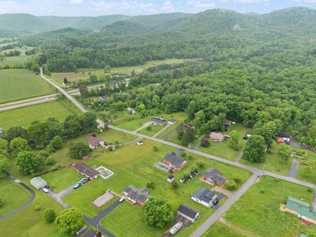 279 Hatton Creek Rd, Stanton, KY 40380 - aerial view of property and surrounding area with a heavily wooded area and a mountain backdrop
